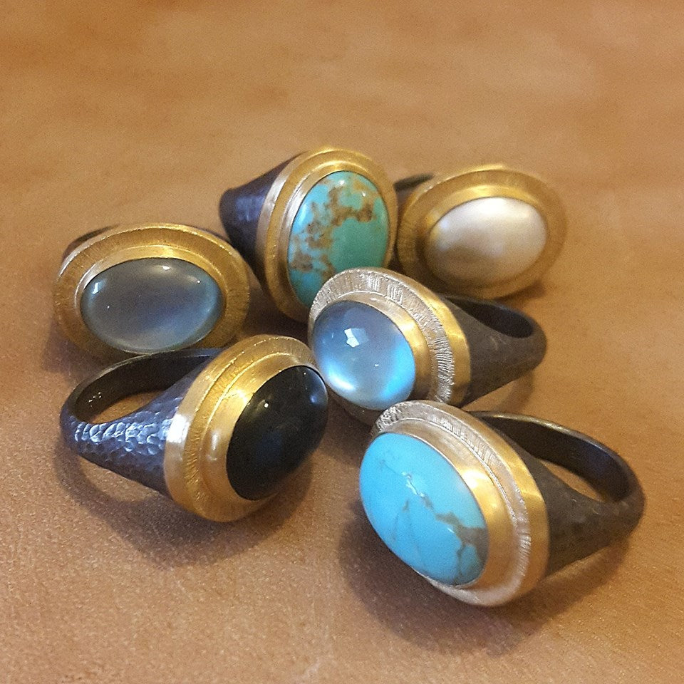 multiple gemstone rings together