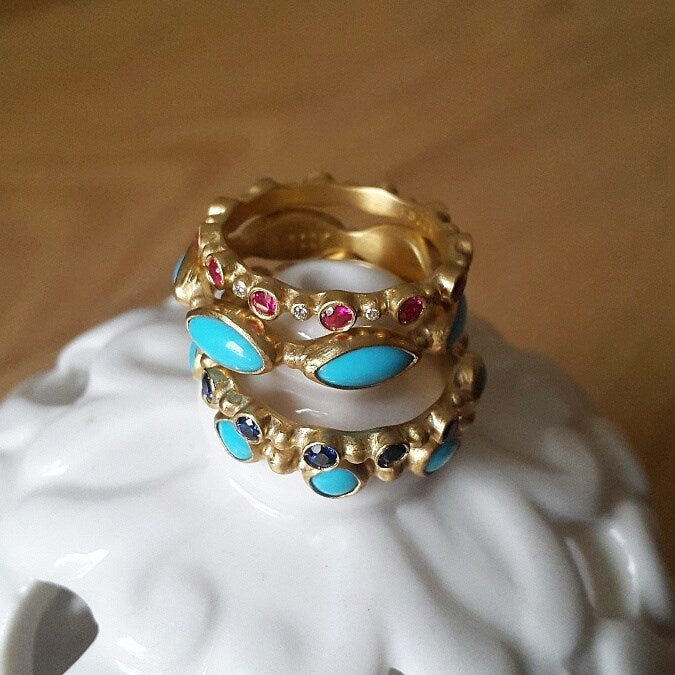 gold bands stacked on top of each other