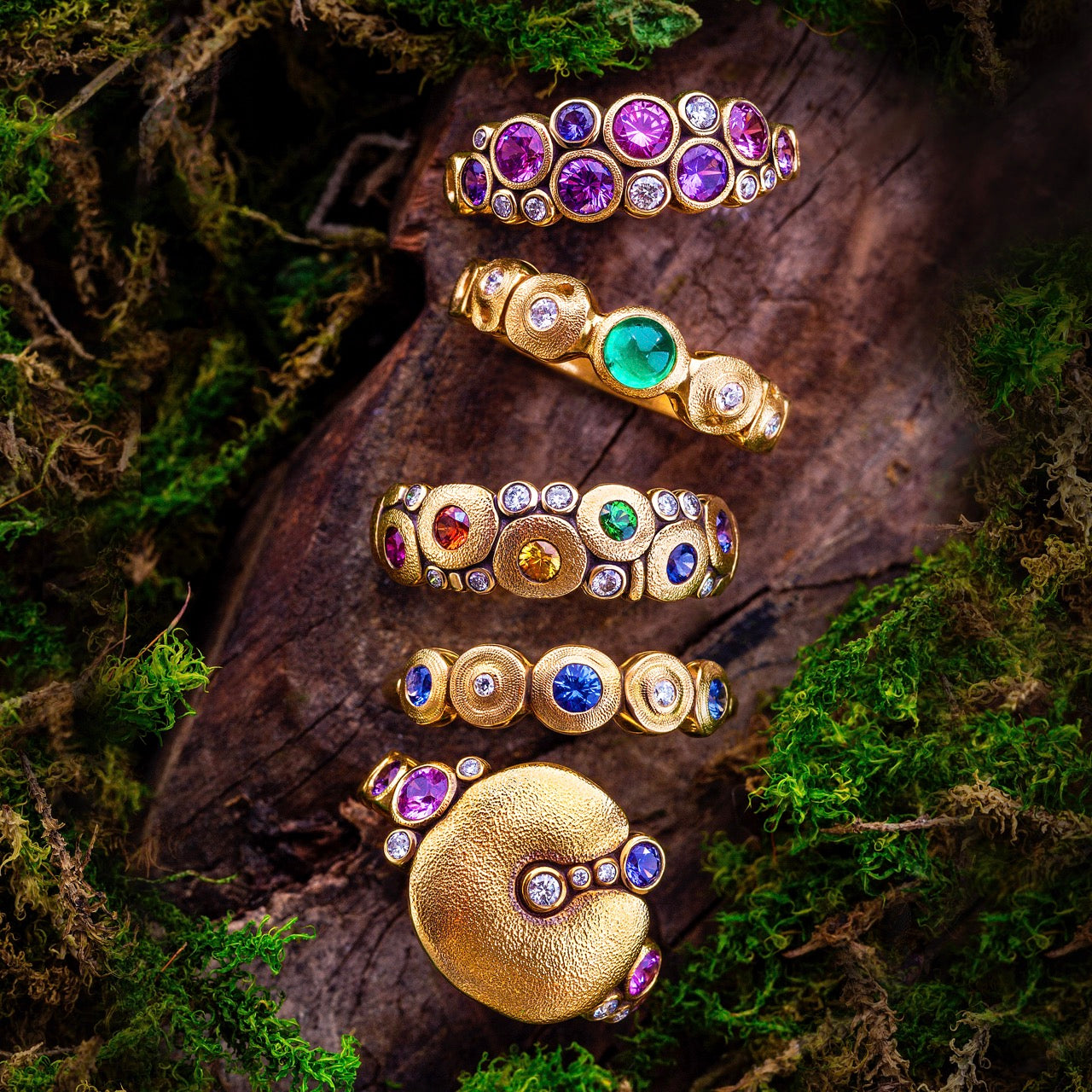 vertical view of multiple gemstone rings