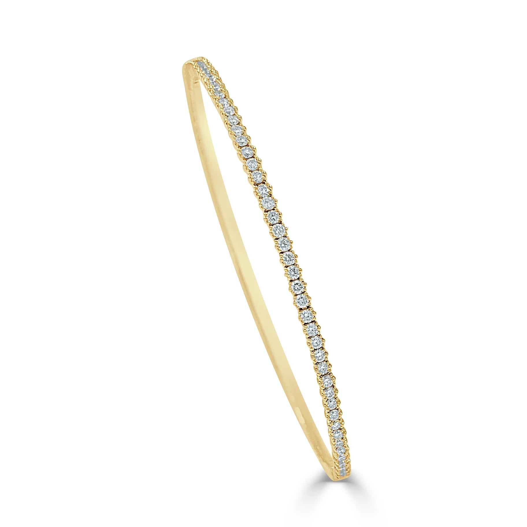 gold bangle with diamonds surrounding