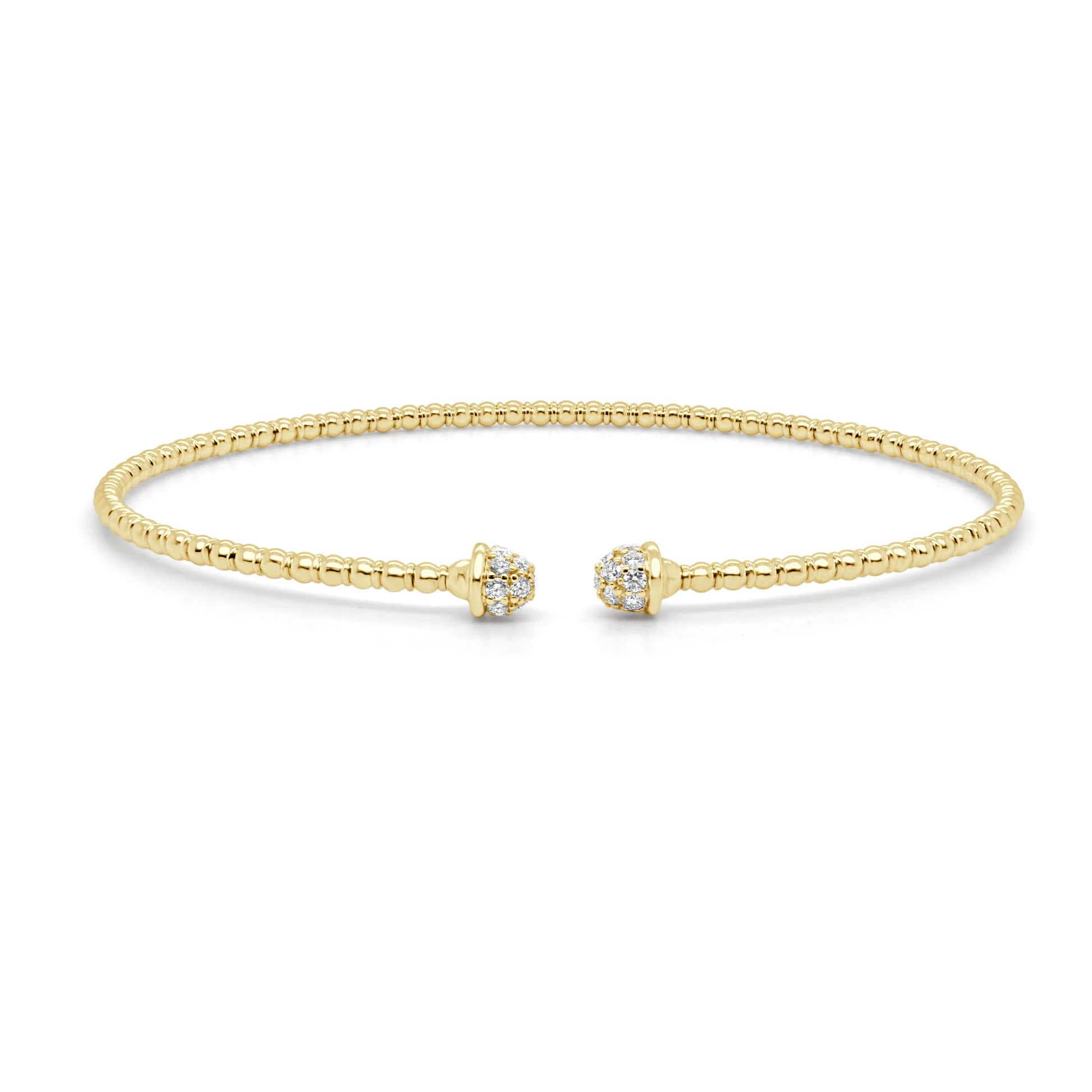 gold bracelet with diamonds at the ends