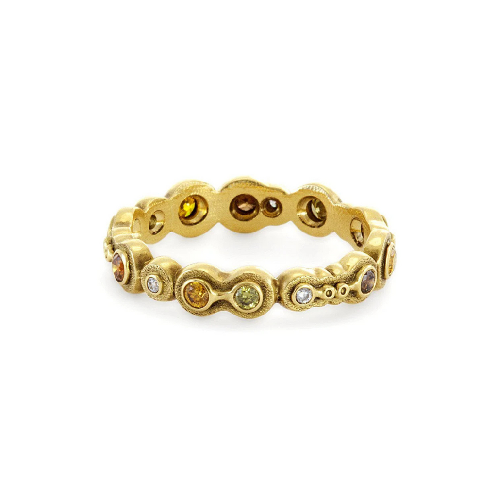 gold bands with gemstones and diamonds