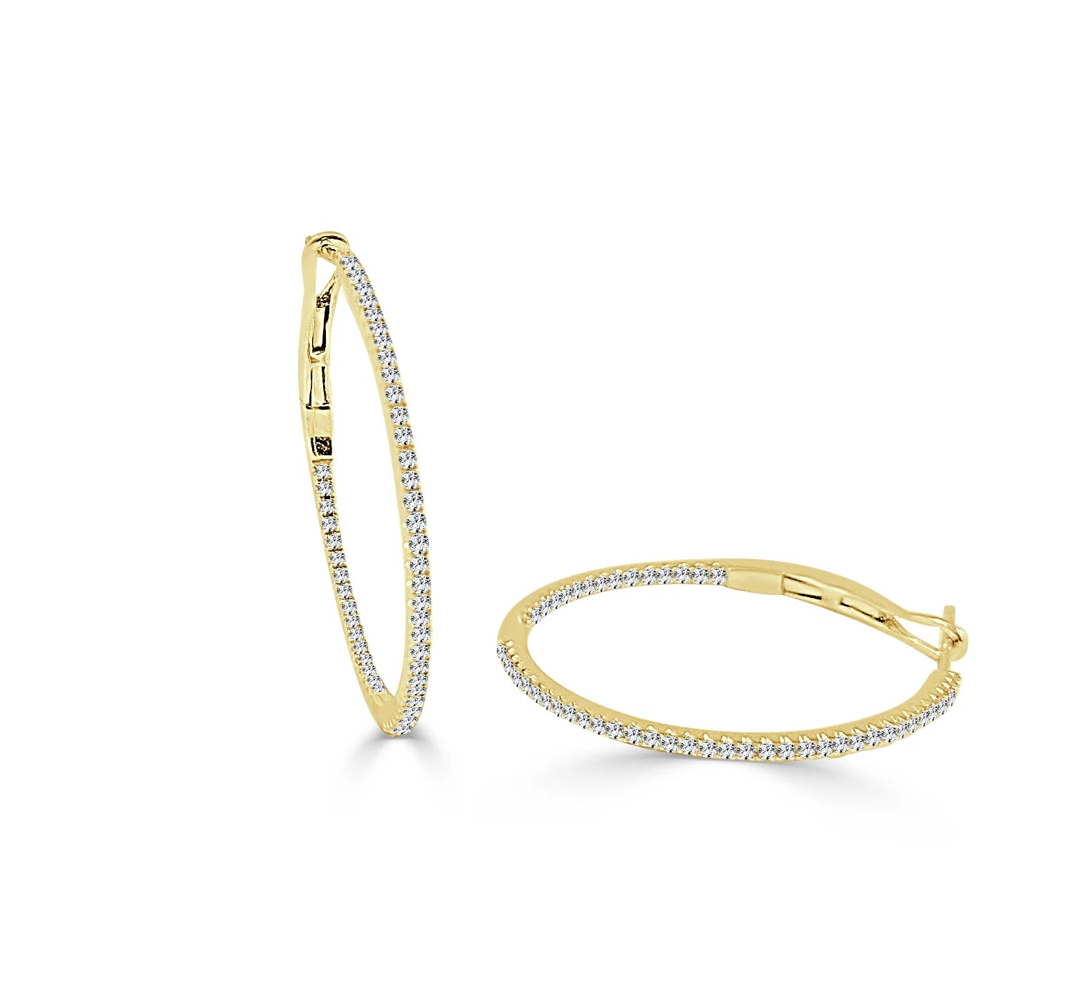 gold hoops with diamond with one standing up and one laying down 