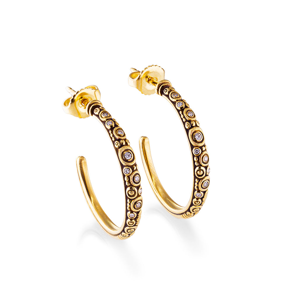 gold and black with diamond hoops standing on their own