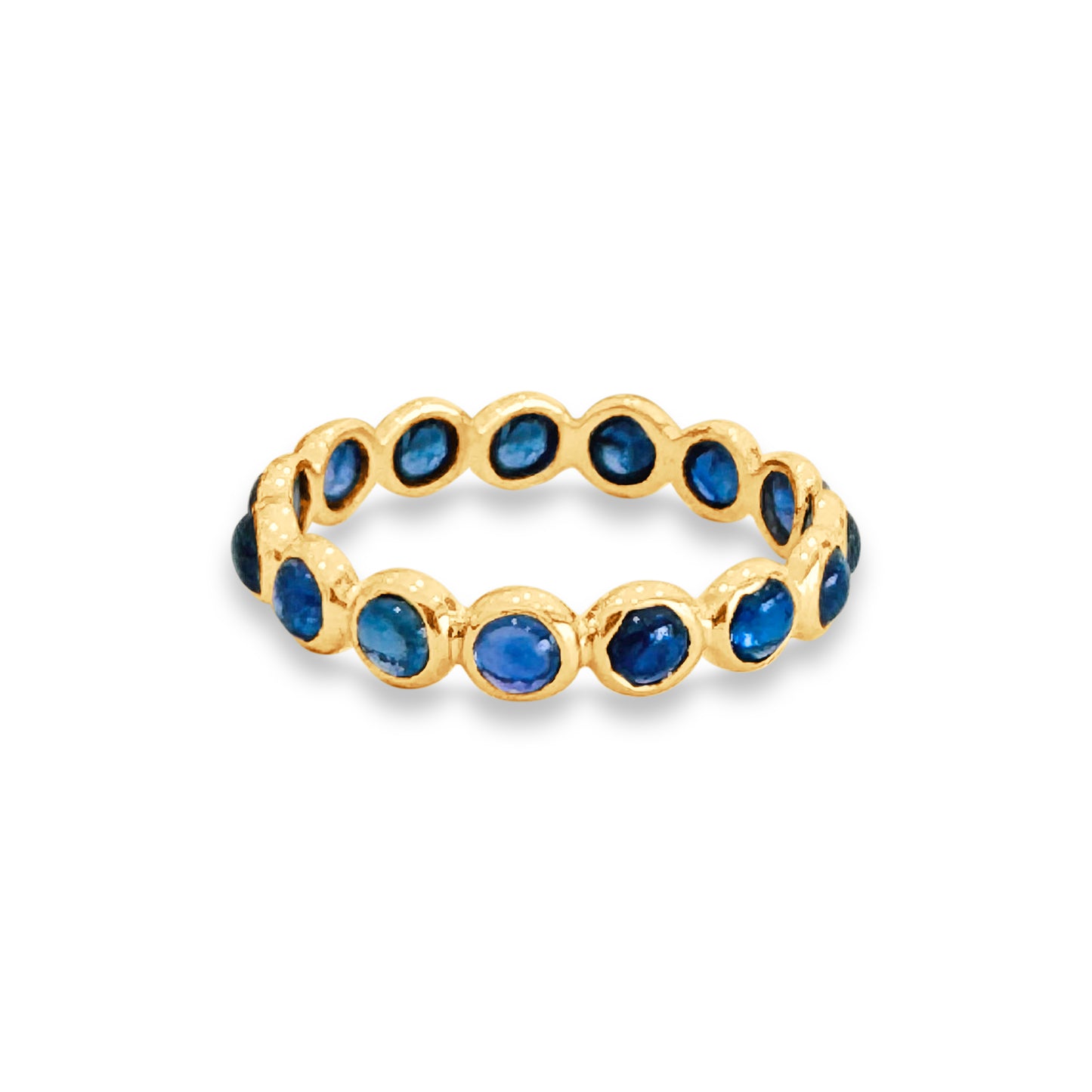 blue sapphire ring with gemstones surrounded by gold