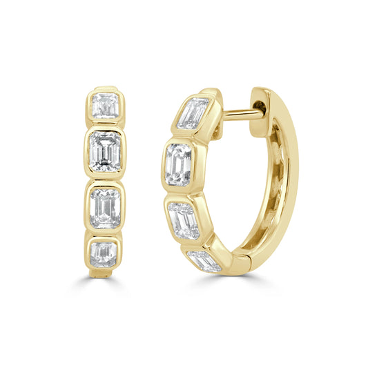 gold huggies with emerald cut diamonds