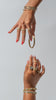 bangles between models hands