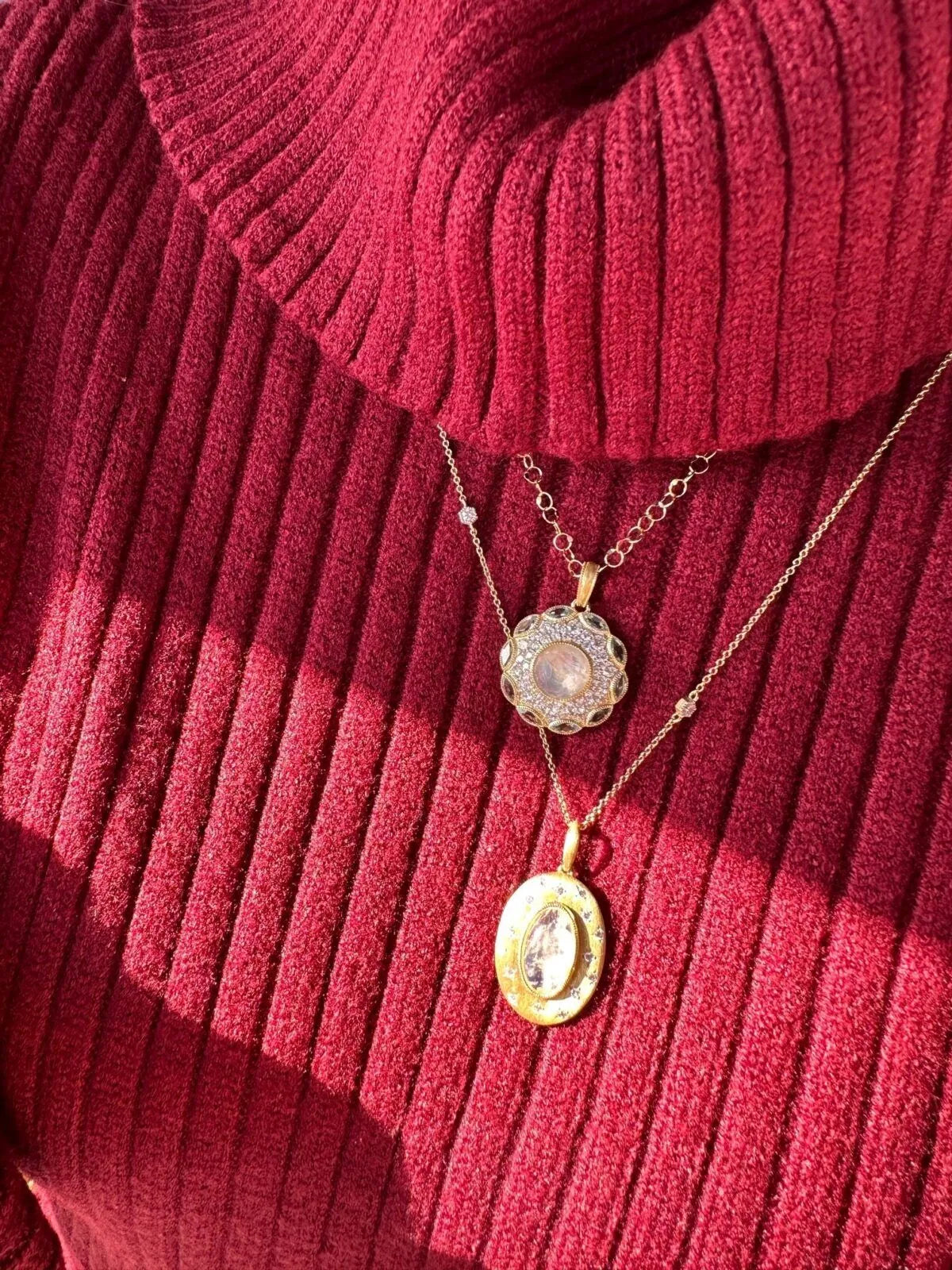 sweater with two pendant necklaces