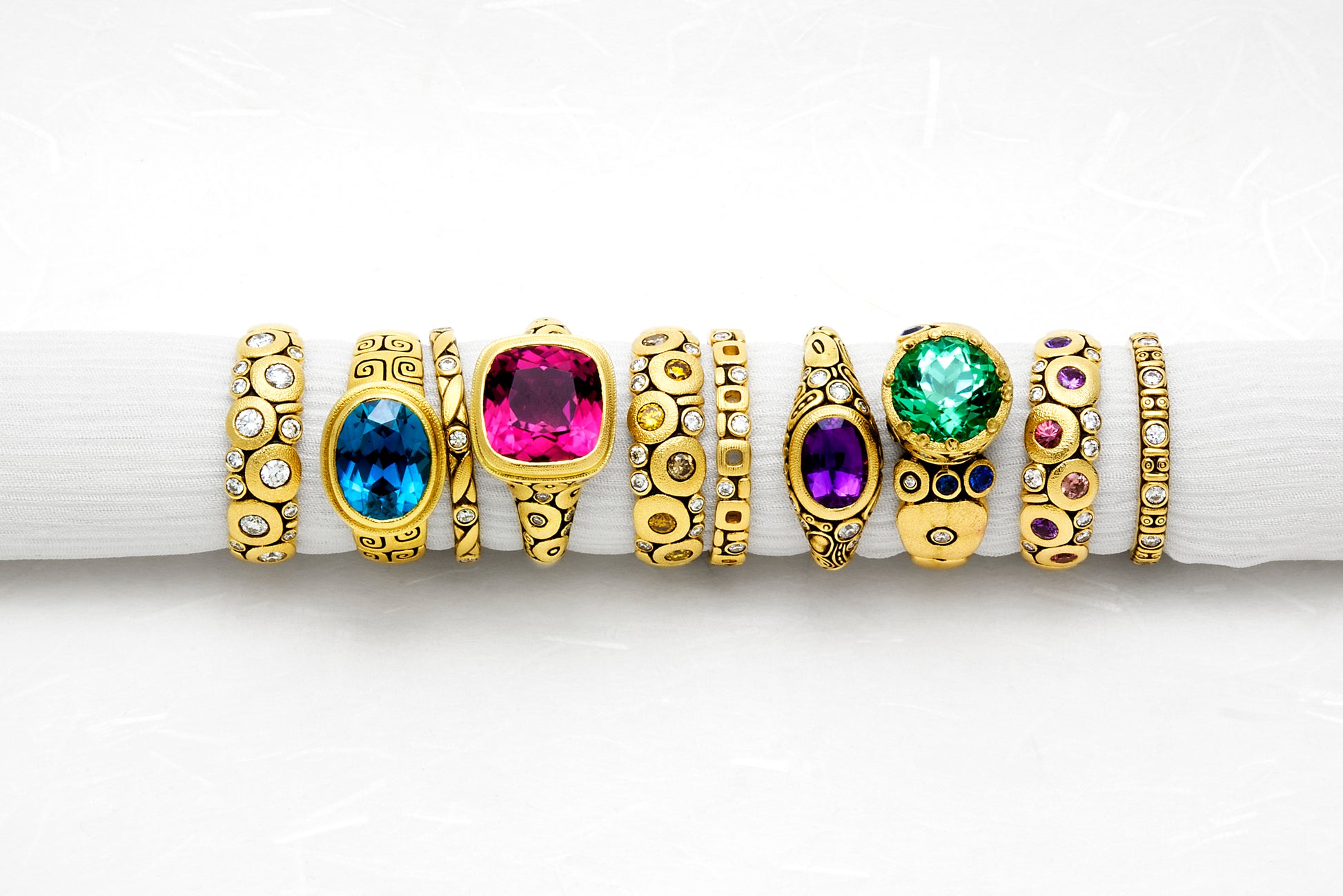 collection of gemstone and diamond rings 