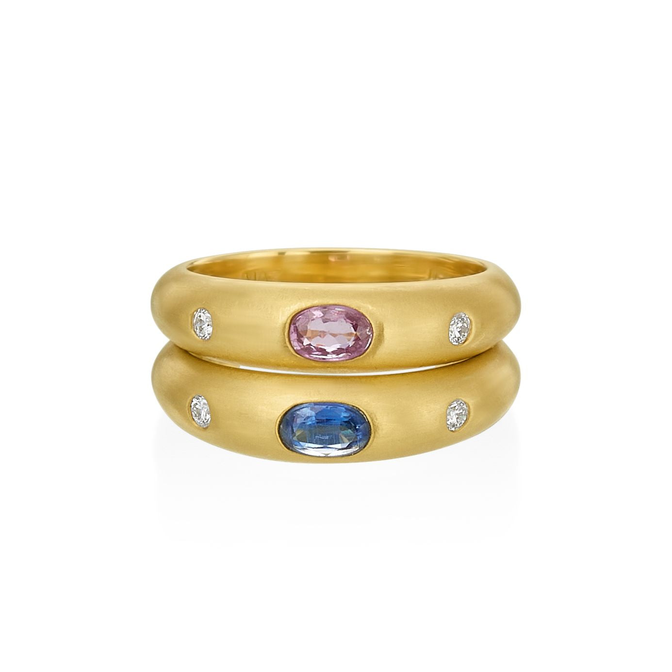 colorful gemstones stacked on two rings