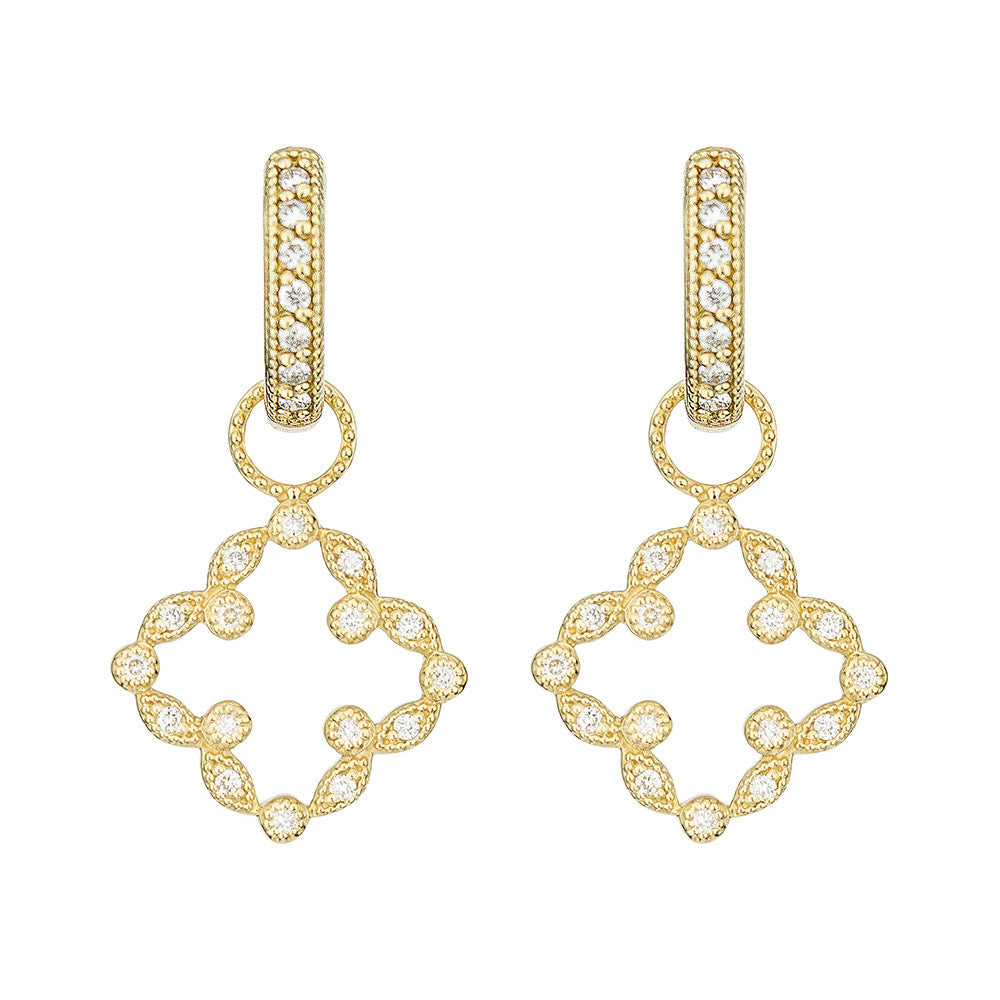 gold earrings with diamond in a clover shape