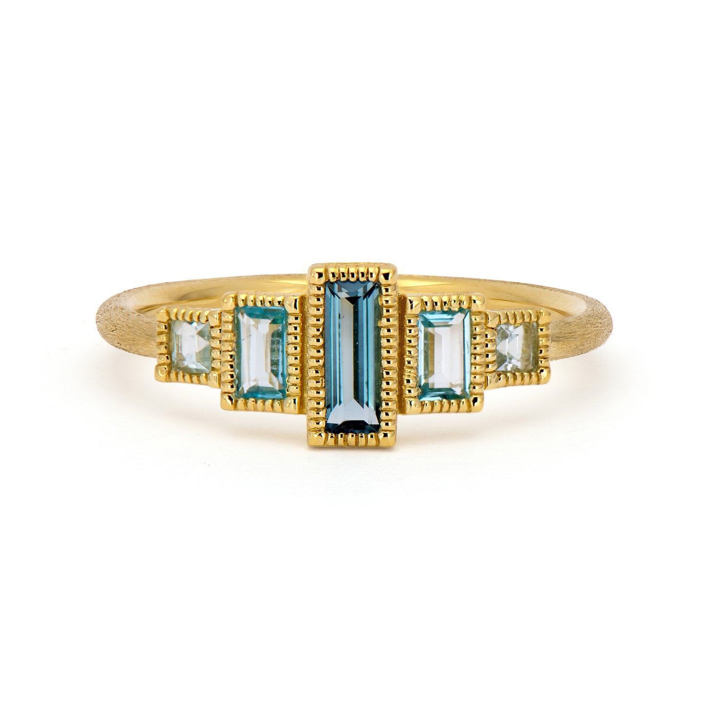 gold ring with colorful gemstones